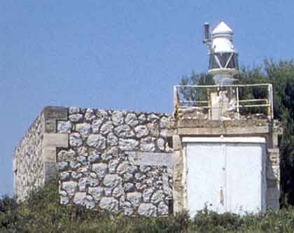 Sfaktiria lighthouse
Source of the photo: [url=http://www.faroi.com/]Lighthouses of Greece[/url]

Keywords: Greece;Mediterranean sea