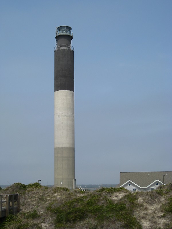 North Carolina / Oak Island lighthouse
Author of the photo: [url=http://www.flickr.com/photos/21953562@N07/]C. Hanchey[/url]
Keywords: North Carolina;Atlantic ocean;United States;Oak Island