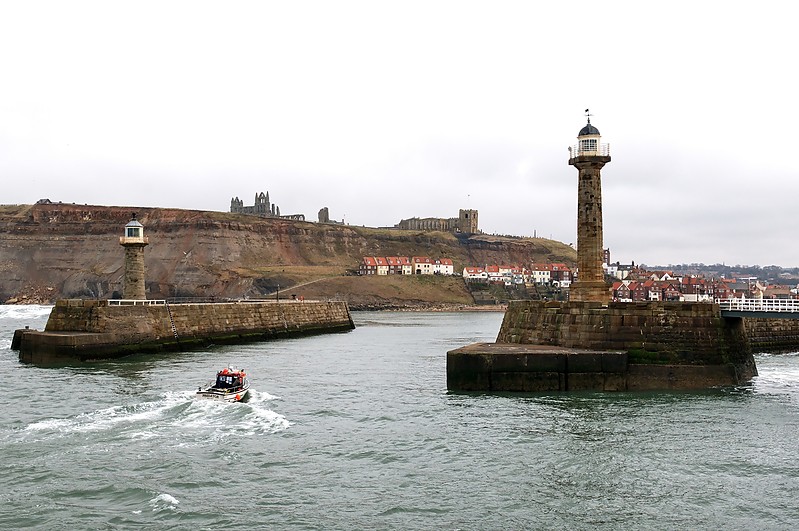 Whitby harbour old lighthouses
Right stone tower: Whitby West Pier old lighthouse 
Left stone tower: Whitby East Pier old lighthouse 
Permission granted by [url=http://sean.kiev.ua/]Sean[/url]
Keywords: Scarborough;England;North sea;United Kingdom