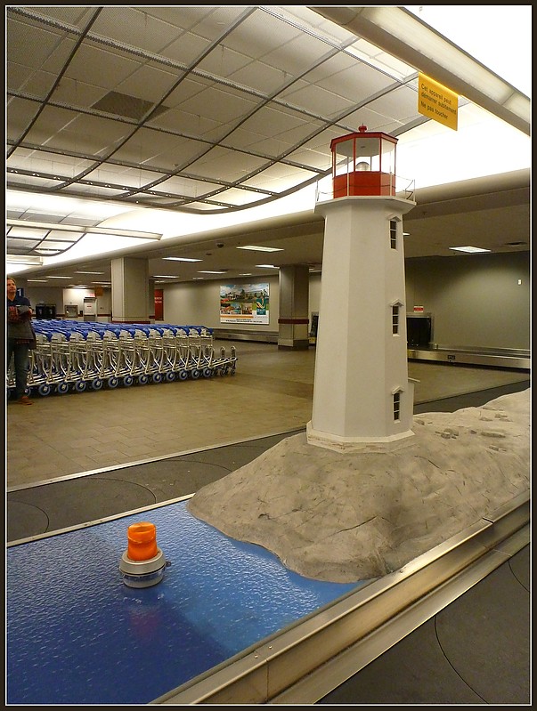 Canada / Halifax airport lighthouse model
Author of the photo: [url=https://www.flickr.com/photos/9742303@N02/albums]Kaye Duncan[/url]

Keywords: Stuff