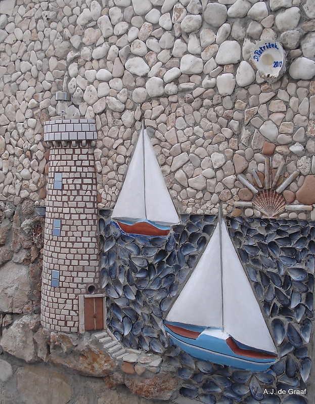 Croatia / Susak Island / Lighthouse mozaik in a housewall
Keywords: Artwork