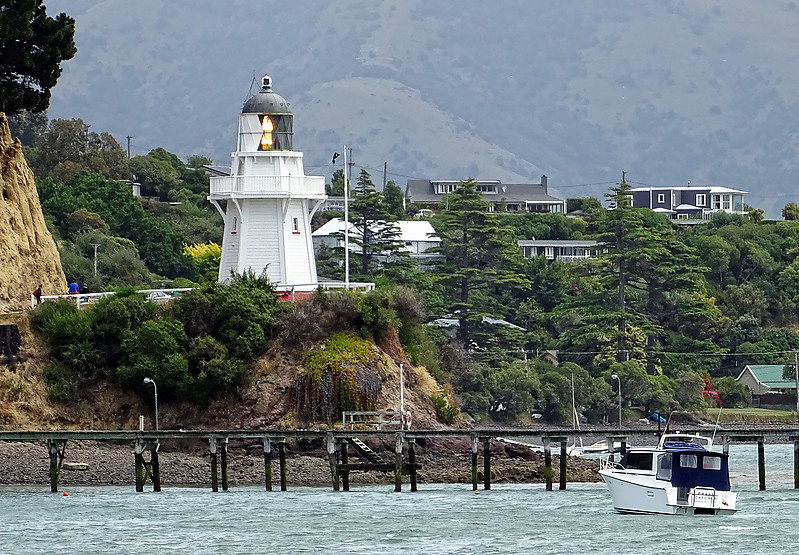 Akaroa Head Lighthouse
Akaroa Head lighthouse was once located on the headland of Akaroa Heads. In 1977 the lighthouse was replaced by a 3 metre fibreglass tower with an automated light. On the 2nd of August in 1980, Akaroa Head Lighthouse was moved to its current location at Cemetery Point by the Akaroa Lighthouse Preservation Society. 

Akaroa Head lighthouse has been inactive since 1977 but is sometimes lit on holidays, special occasions and when a cruise ship anchors in Akaroa Harbour.

Keywords: Akaroa;New Zealand;Pacific Ocean