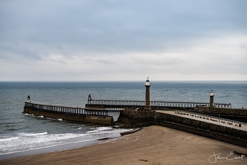 Whitby harbour lighthouses
Left stone tower: Whitby West Pier old lighthouse 
Left sceletal tower with lantern: Whitby West Pier light
Right stone tower: Whitby East Pier old lighthouse 
Right sceletal tower with lantern: Whitby East Pier light
Keywords: England;North sea;United Kingdom;Whitby